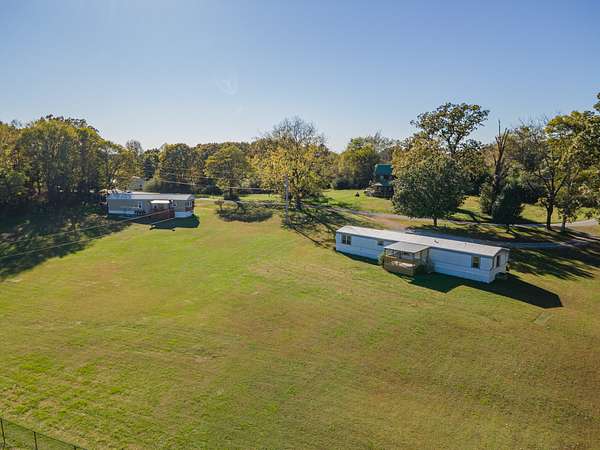 1.5 Acres of Residential Land with Home for Sale in Nunnelly, Tennessee