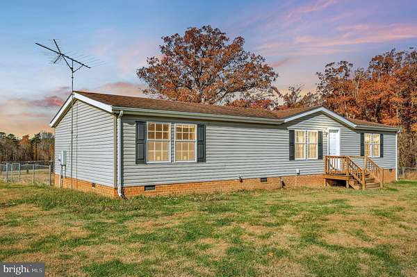 6.76 Acres of Land with Home for Sale in Palmyra, Virginia