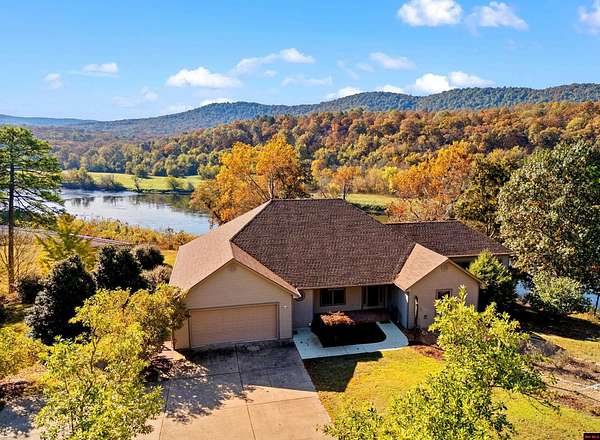 11.5 Acres of Land with Home for Sale in Mountain Home, Arkansas