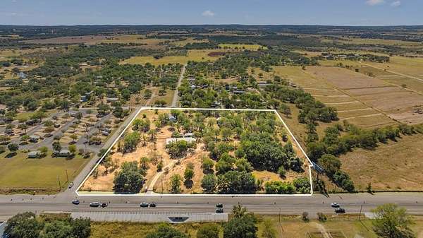 10.7 Acres of Land with Home for Sale in Stonewall, Texas