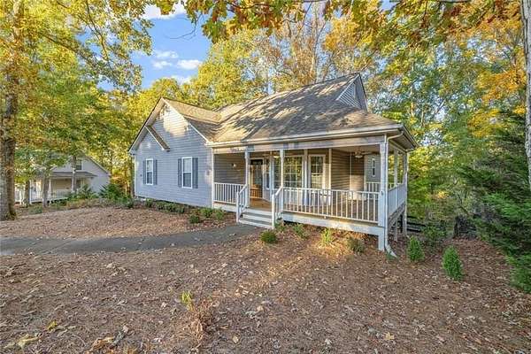 1.55 Acres of Residential Land with Home for Sale in Cumming, Georgia