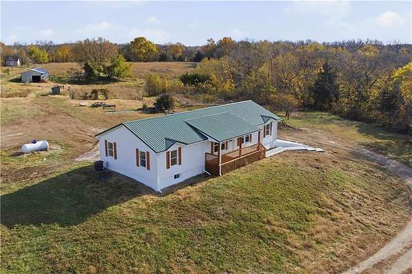 11.8 Acres of Land with Home for Sale in Tonganoxie, Kansas