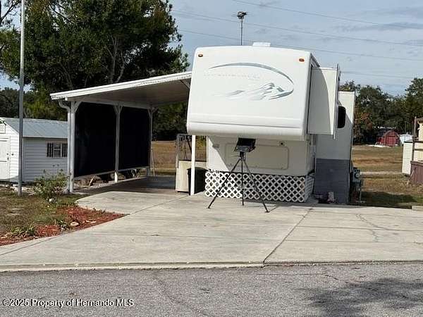 0.06 Acres of Land for Sale in Weeki Wachee, Florida