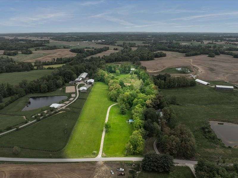 20.4 Acres of Land with Home for Auction in Henderson, Kentucky