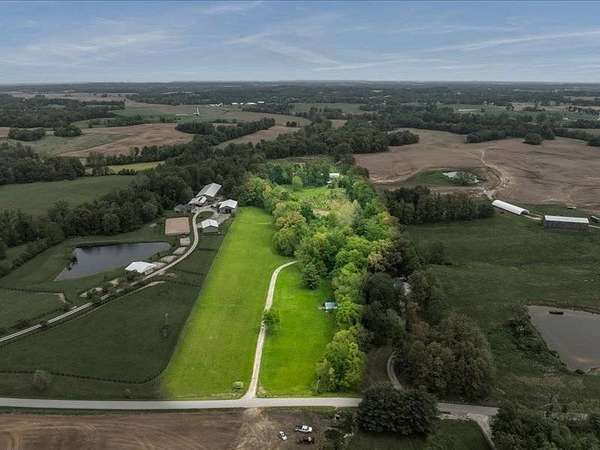 20.4 Acres of Land with Home for Auction in Henderson, Kentucky