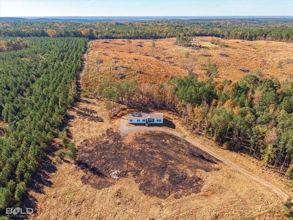 9.8 Acres of Residential Land with Home for Sale in Plain Dealing, Louisiana