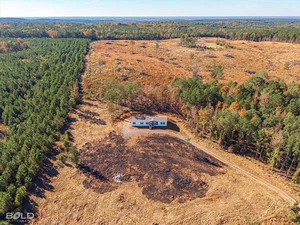 9.8 Acres of Residential Land with Home for Sale in Plain Dealing, Louisiana