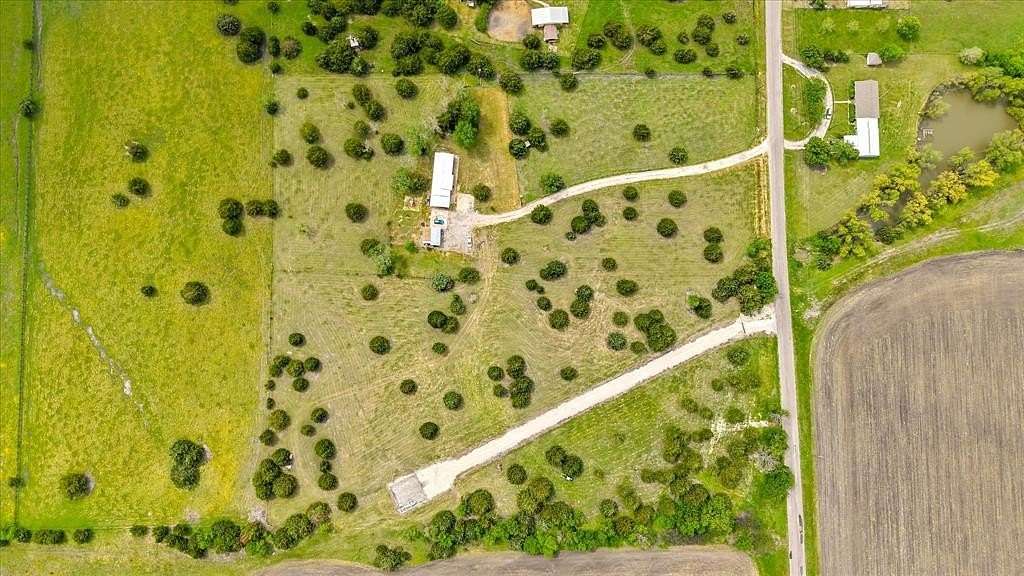 9 Acres of Residential Land with Home for Sale in Royse City, Texas