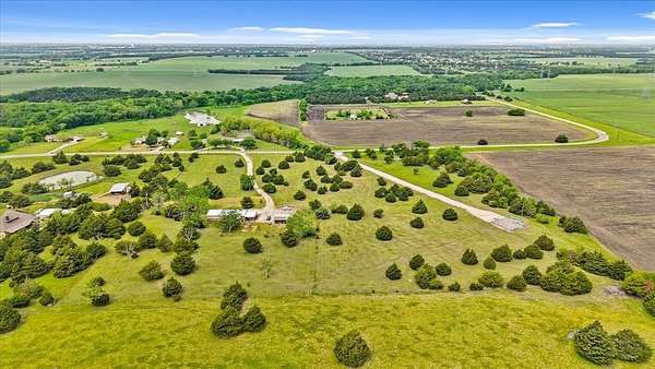 9 Acres of Residential Land with Home for Sale in Royse City, Texas
