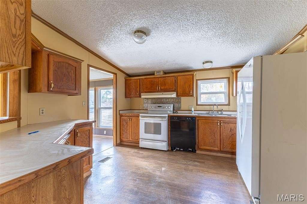 5 Acres of Residential Land with Home for Sale in Doniphan, Missouri