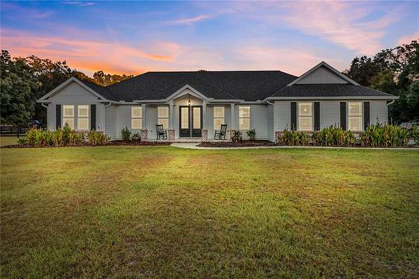 5 Acres of Residential Land with Home for Sale in Alachua, Florida