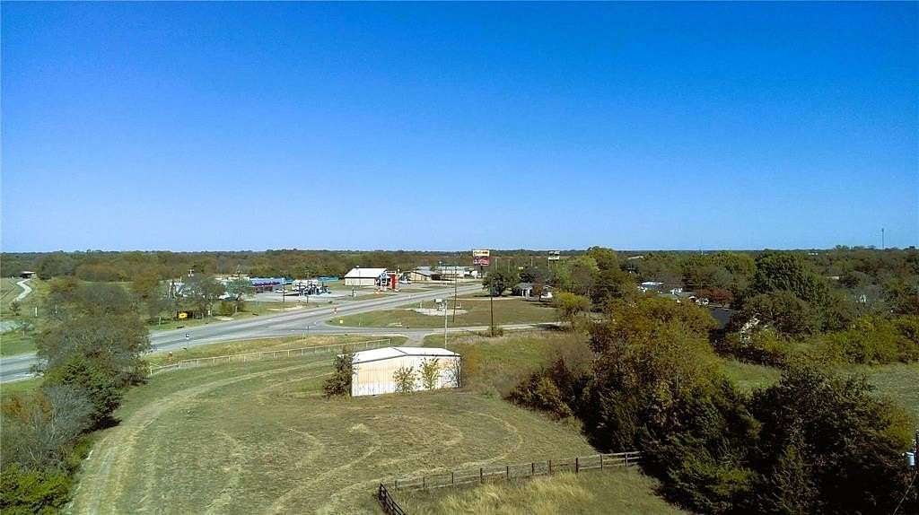 27.4 Acres of Agricultural Land with Home for Sale in Trenton, Texas