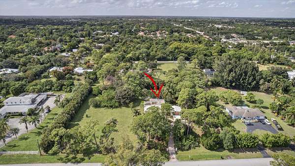 2.27 Acres of Residential Land with Home for Sale in Palm Beach Gardens, Florida