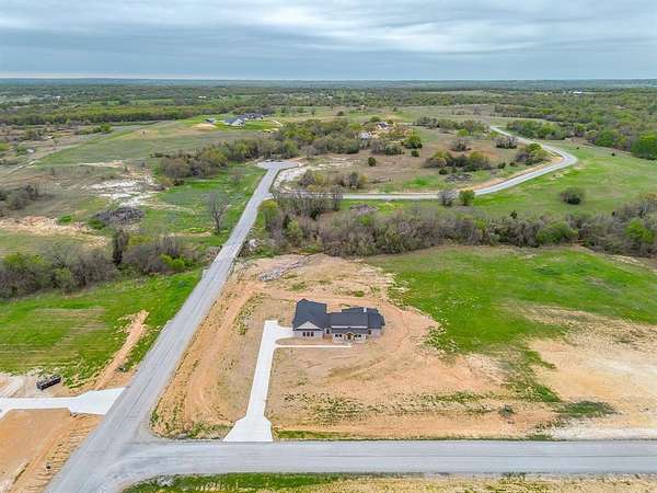 2 Acres of Land with Home for Sale in Poolville, Texas
