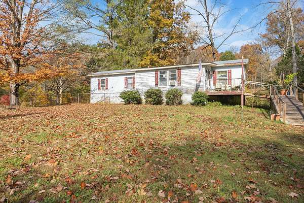 5.5 Acres of Residential Land with Home for Sale in Pleasant View, Tennessee