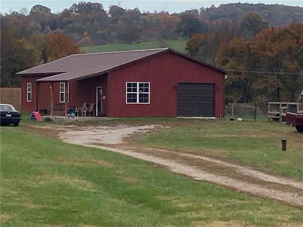 1.5 Acres of Land with Home for Sale in Green Forest, Arkansas