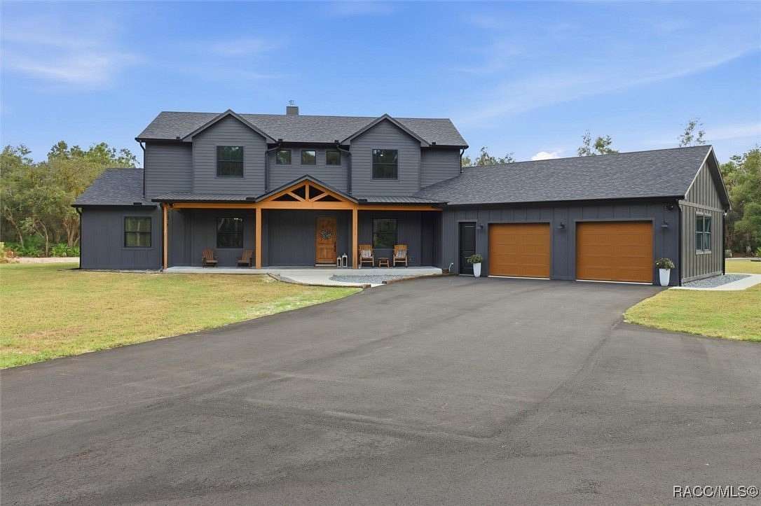 10 Acres of Recreational Land with Home for Sale in Inglis, Florida