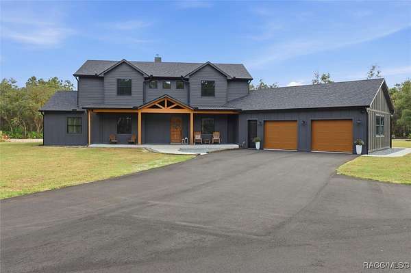 10 Acres of Recreational Land with Home for Sale in Inglis, Florida