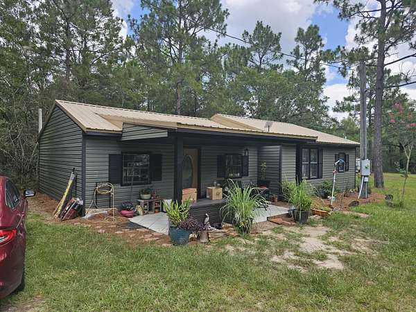 3.67 Acres of Residential Land with Home for Sale in DeFuniak Springs, Florida