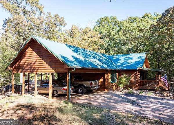 63.4 Acres of Recreational Land with Home for Sale in Woodland, Georgia