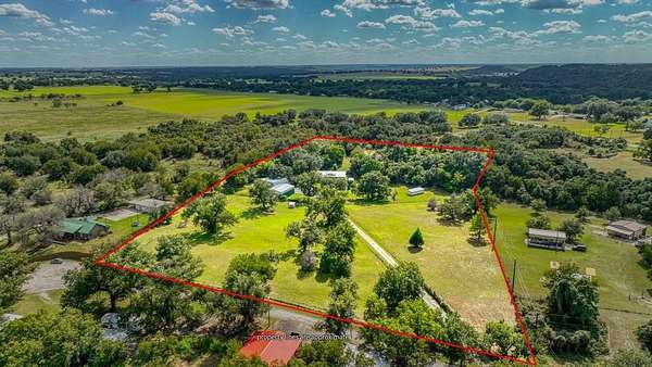 6.36 Acres of Land with Home for Sale in Millsap, Texas