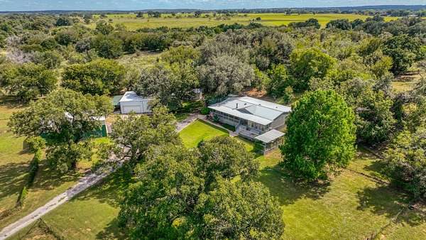 6.36 Acres of Land with Home for Sale in Millsap, Texas