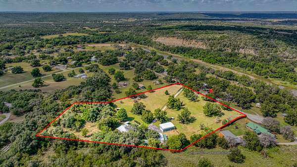 6.36 Acres of Land with Home for Sale in Millsap, Texas