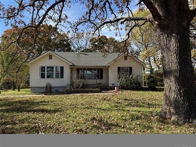 6.65 Acres of Land with Home for Sale in Wyandotte, Oklahoma