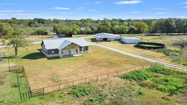 58.8 Acres of Agricultural Land with Home for Sale in Mexia, Texas