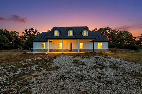 5 Acres of Residential Land with Home for Sale in Cumby, Texas