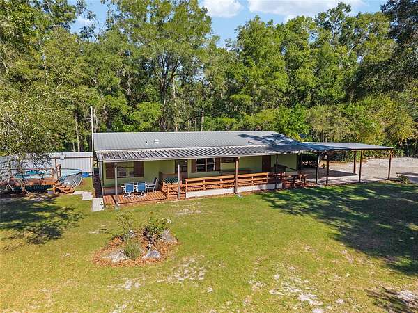 6 Acres of Residential Land with Home for Sale in Archer, Florida