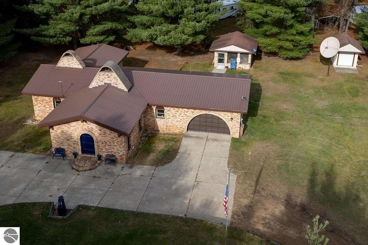 3 Acres of Land with Home for Sale in Harrison, Michigan