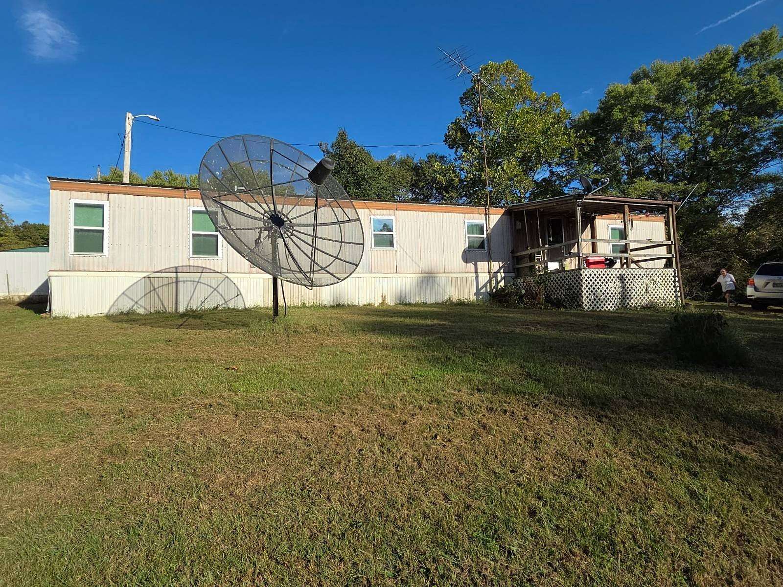 15 Acres of Recreational Land with Home for Auction in Goodman, Missouri