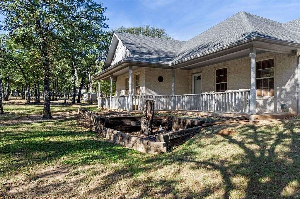 2.46 Acres of Residential Land with Home for Sale in Paradise, Texas