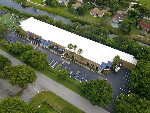 1.79 Acres of Improved Commercial Land for Sale in Mangonia Park, Florida