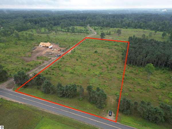 5 Acres of Residential Land for Sale in Maple City, Michigan