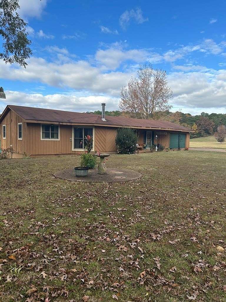 7.8 Acres of Residential Land with Home for Sale in Oakland, Mississippi