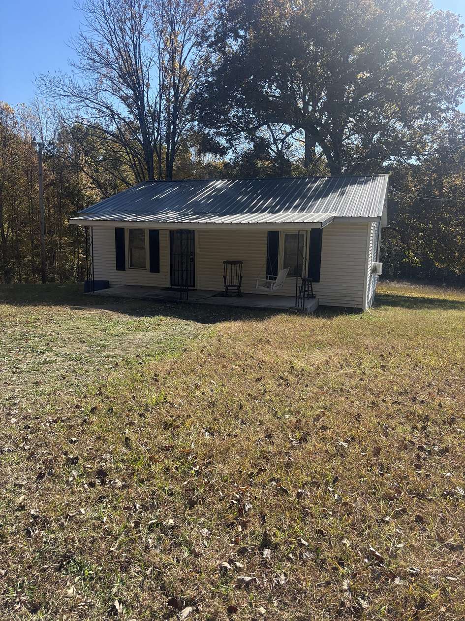 2.13 Acres of Residential Land with Home for Sale in Camden, Tennessee