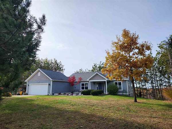 10 Acres of Residential Land with Home for Sale in Ellsworth, Michigan