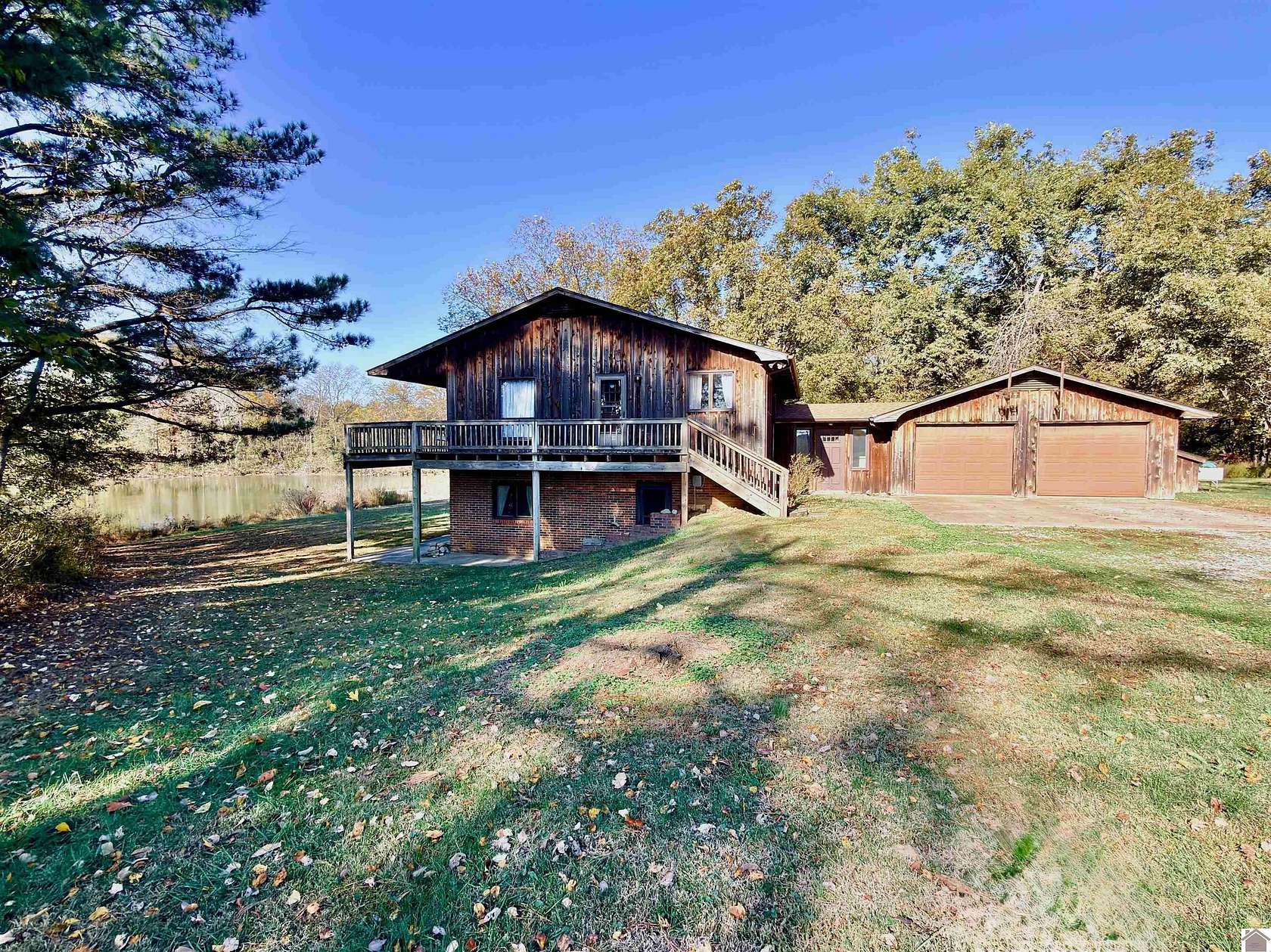 188 Acres of Land with Home for Sale in Kevil, Kentucky