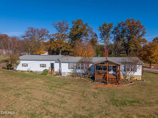 5 Acres of Residential Land with Home for Sale in White Pine, Tennessee