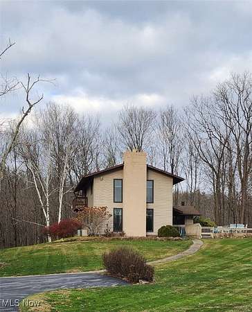 4.77 Acres of Residential Land with Home for Auction in Akron, Ohio