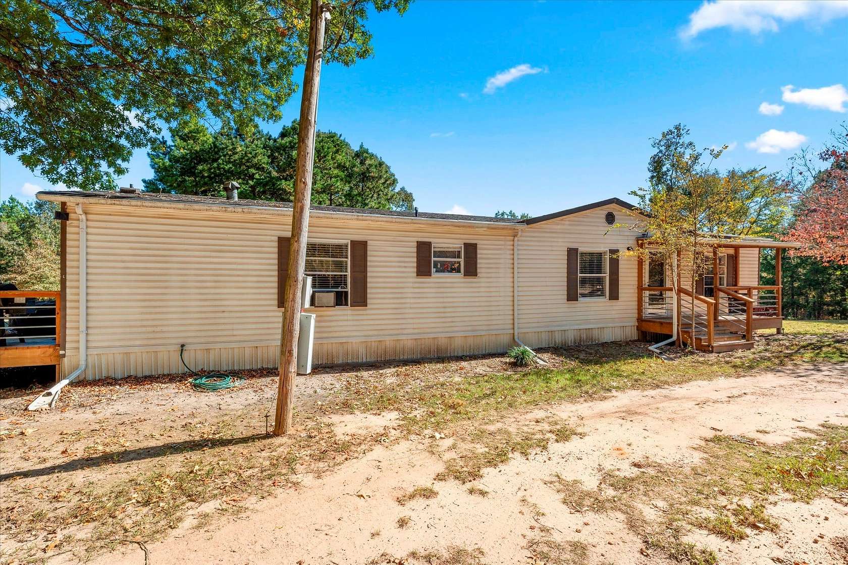 6.75 Acres of Land with Home for Sale in Leesburg, Texas