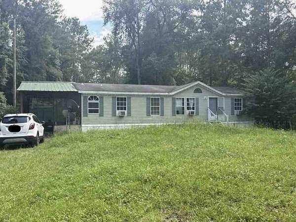 2.34 Acres of Residential Land with Home for Auction in Green Cove Springs, Florida