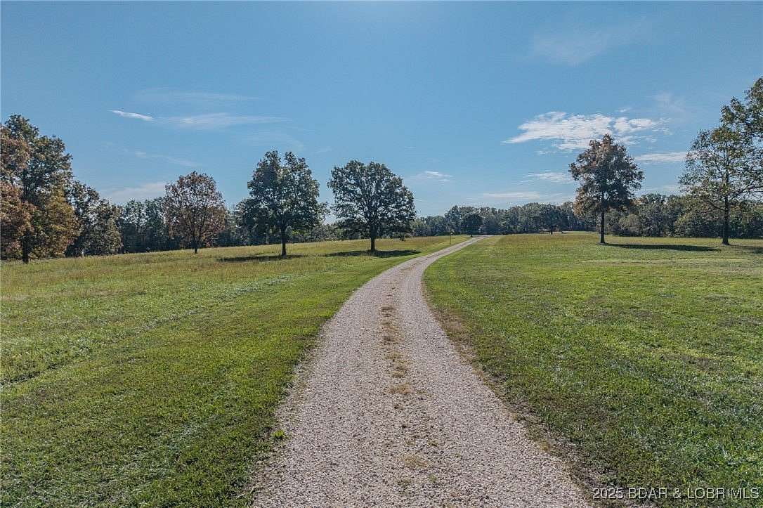 49.7 Acres of Land with Home for Sale in Camdenton, Missouri