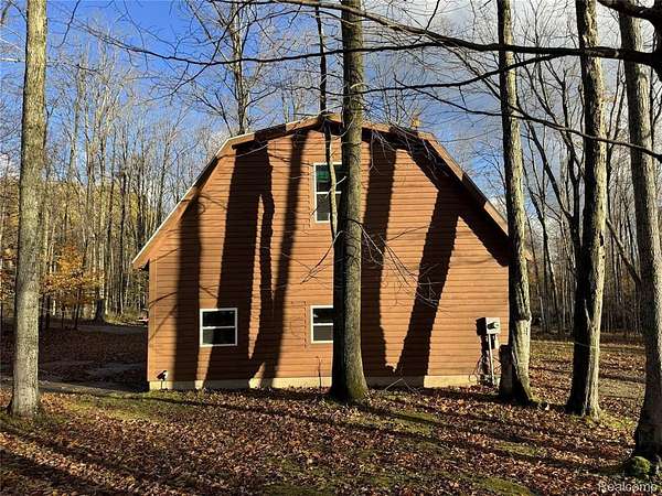 20 Acres of Land with Home for Sale in Marion Township, Michigan