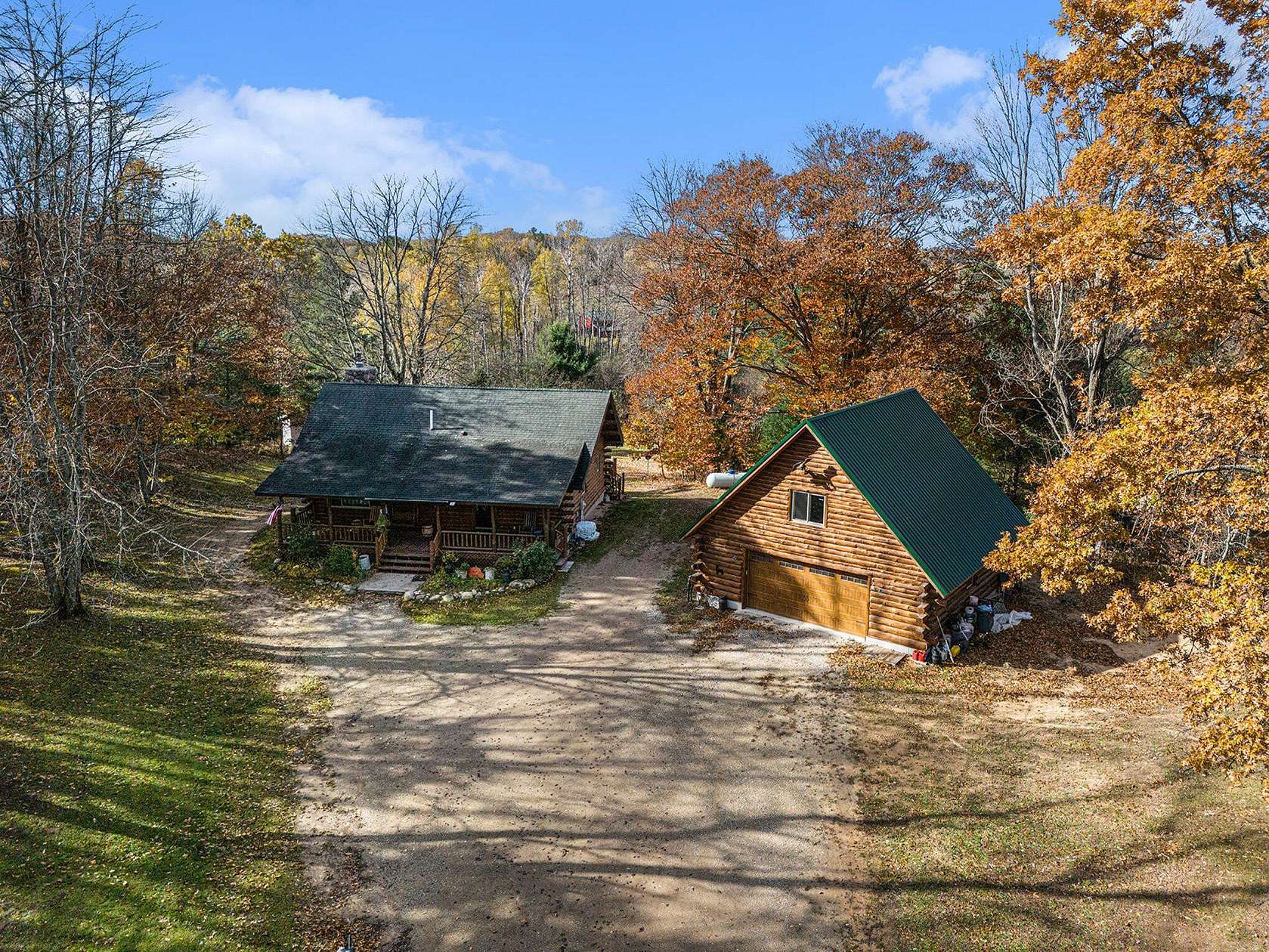 68.6 Acres of Recreational Land with Home for Sale in Irons, Michigan