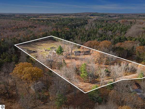 5.59 Acres of Land with Home for Sale in Kalkaska, Michigan