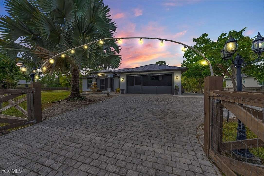 1.5 Acres of Residential Land with Home for Sale in Lehigh Acres, Florida