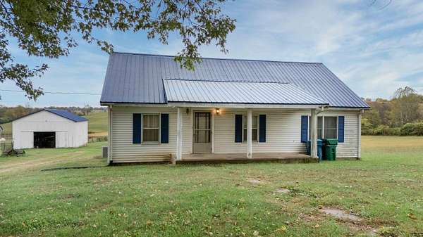 32.7 Acres of Agricultural Land with Home for Auction in Lawrenceburg, Kentucky